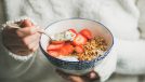 fresh fruit and berries with yogurt and granola
