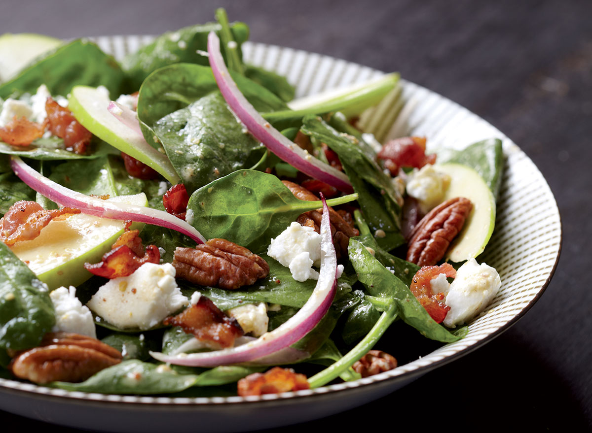 Healthy spinach & goat cheese salad with apples & warm bacon dressing