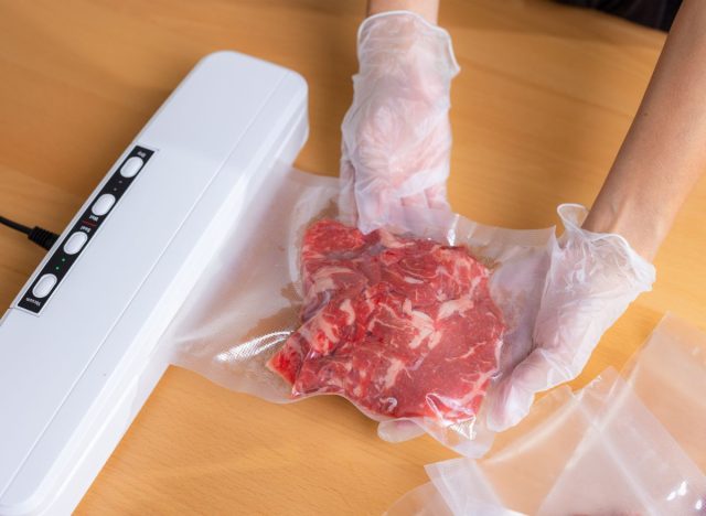 Vacuum sealer sealing beef